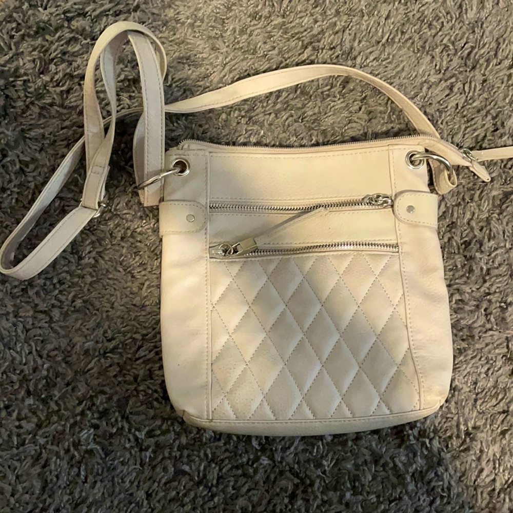 Small/medium sized gray purse. Small staining inside otherwise decent